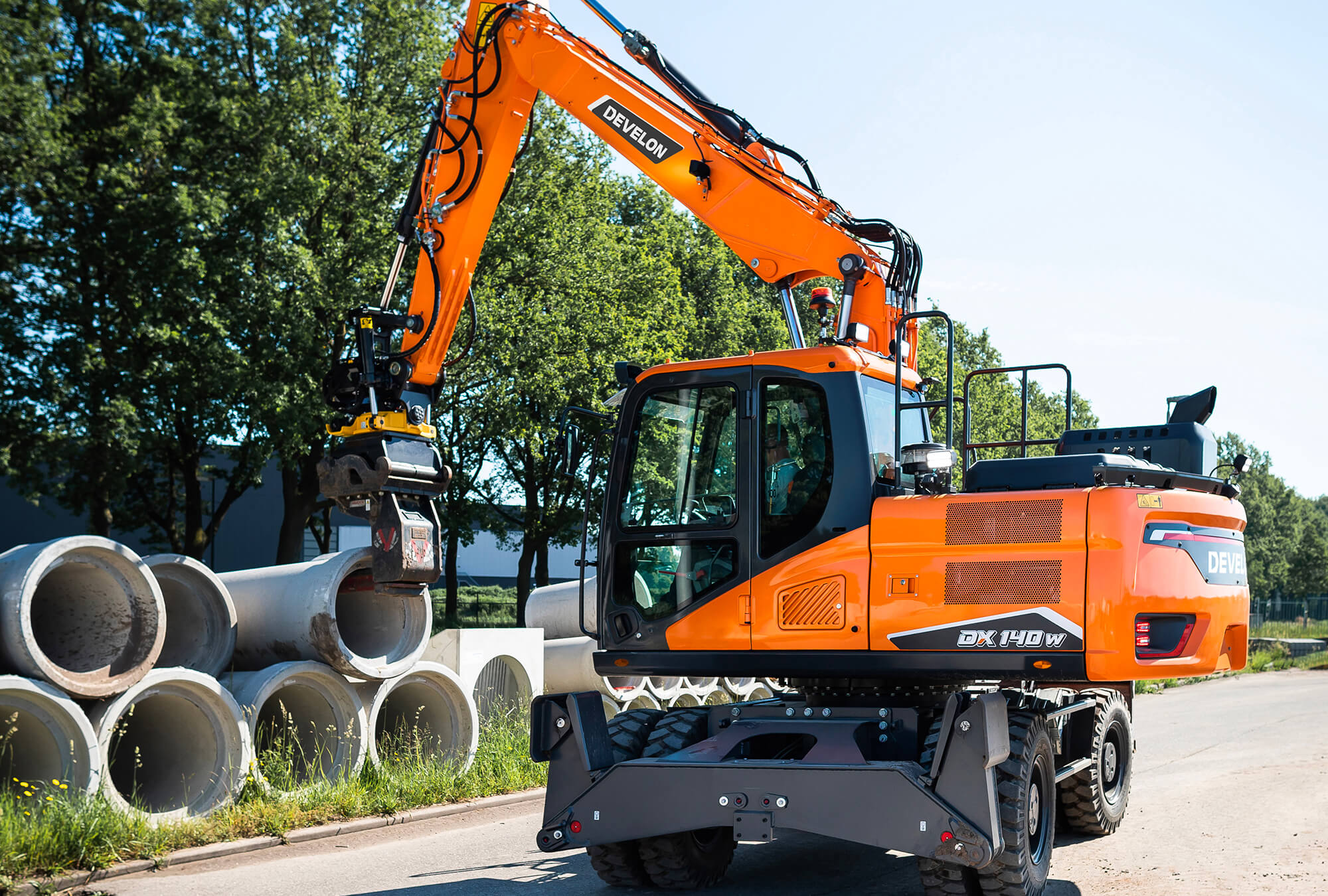 Excavadoras sobre Neumáticos DEVELON Imagen