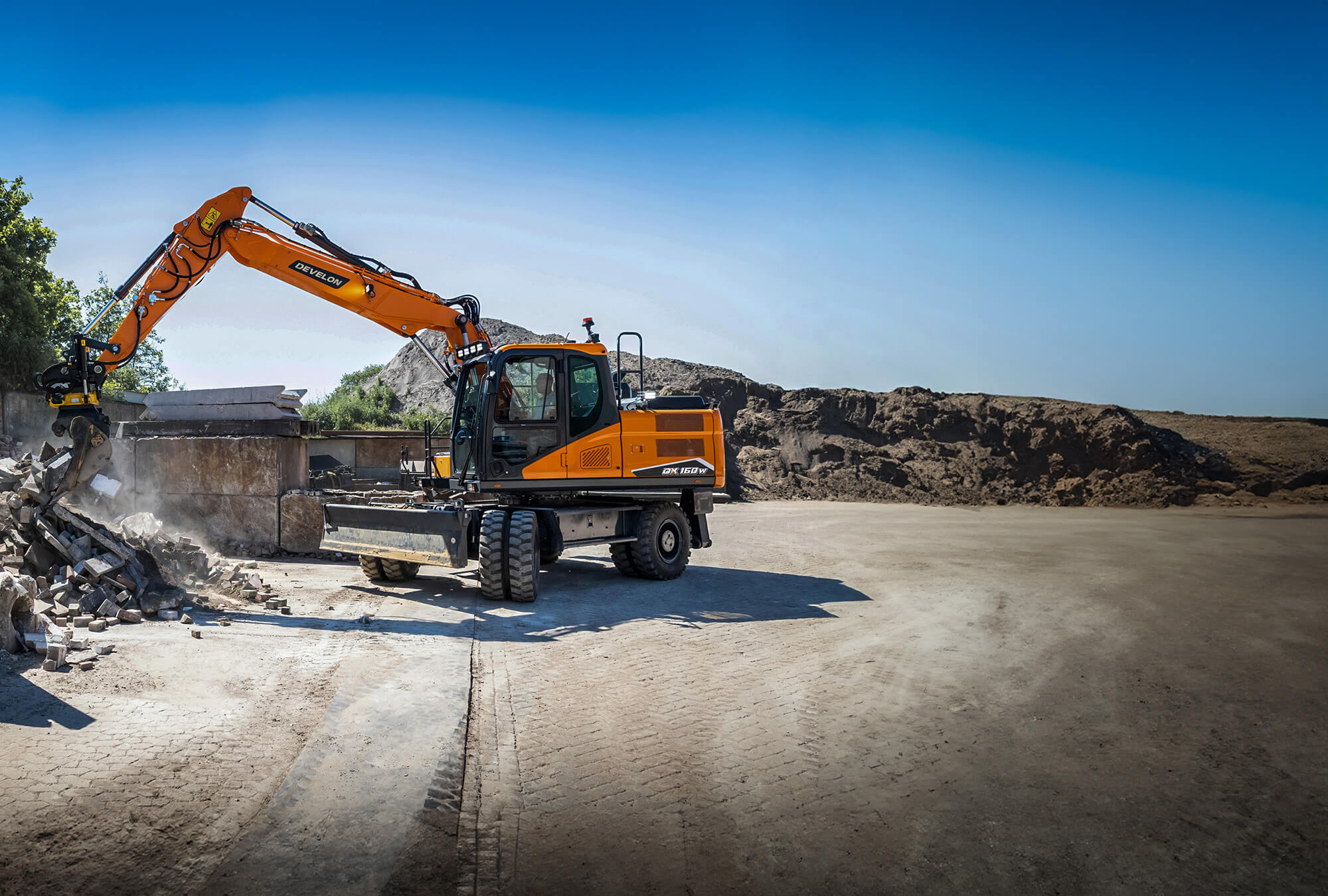 Excavadoras sobre Neumáticos DEVELON Imagen