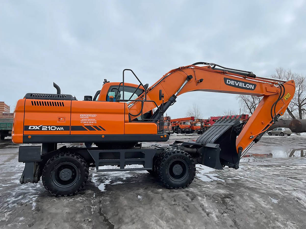 Excavadoras sobre Neumáticos DEVELON Imagen